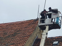 Naprawienie ubytków w starej części dachu na kościele po zniszczeniu przez wichurę '2022